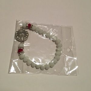 Red and white beaded bracelet